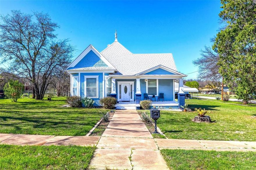 Prepare to fall in love with the classic appeal of this authentic 1920s 3-bedroom, 2-bath home, tucked beneath towering shade trees on almost half an acre. Full of charm and personality, this inviting property features a welcoming front porch, tall ceilings, & hardwood floors. The beautifully remodeled kitchen showcases stainless steel appliances and a trendy brick chimney, opening into a comfortable family room perfect for gatherings. Two lovely bathrooms offer convenience & a touch of luxury, with a vintage clawfoot tub and a spa-like walk-in shower. The garage doubles as a spacious workshop and includes a loft with plenty of room for storage. In 2020, the home received important updates including new plumbing, updated wiring, and new windows in the family room. As a special bonus, several items convey with the sale, including the washer, dryer, refrigerator, range, water cooler, and even some furnishings.