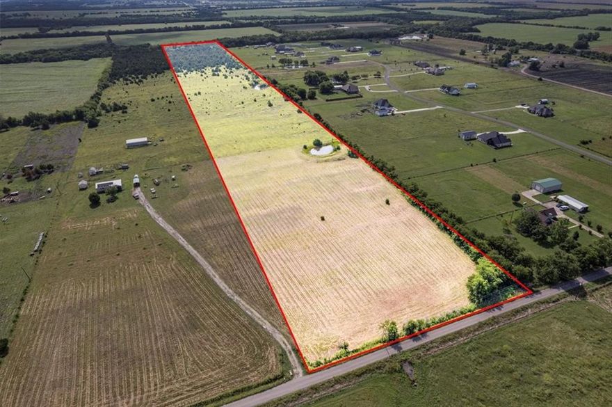 Discover the perfect blend of open space, privacy, and convenience on this beautiful 22.935-acre tract in the heart of the Texas countryside. With 308+SF of road frontage on CR 1061, this property offers easy access while still delivering the peace and quiet of country living buyers crave. The land features spacious open pasture, scattered mature trees, and two picturesque ponds, creating an ideal setting for your custom dream home, barndominium,  ranchette, or recreational retreat. Briar Branch Creek borders the back of the property, adding natural beauty with very minimal floodplain.  Enjoy wide-open skies, abundant wildlife, and the freedom of country living—just far enough from busy city life, yet close enough for daily conveniences. Properties of this size and quality are becoming increasingly popular and hard to find.  A must-see opportunity—don’t miss your chance to own a piece of Texas land before it’s gone.