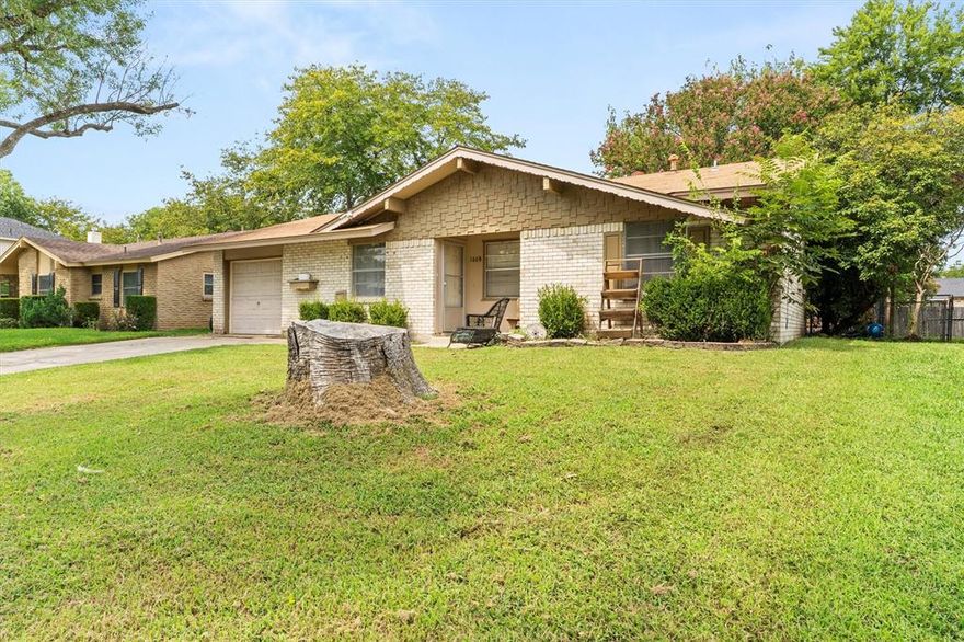 Ranch style home in quiet neighborhood with large backyard.