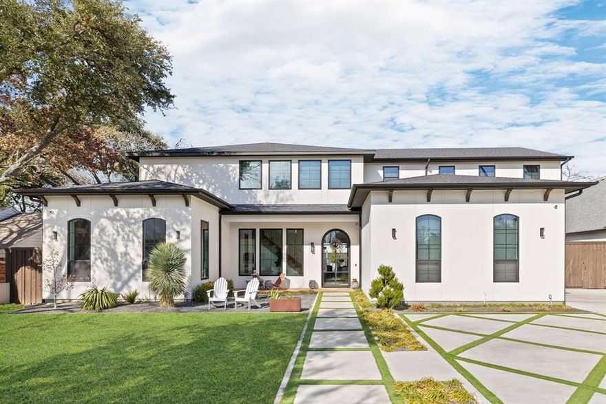Behind a private gate and courtyard entry, this Modern Mediterranean home offers a peaceful retreat in the heart of the city. Smooth stucco walls and graceful arches create timeless curb appeal, while steel-framed windows fill the home with natural light, highlighting wide-plank hardwood floors and designer finishes throughout.
The chef’s kitchen features a dramatic marble waterfall island, custom cabinetry, and statement lighting, opening seamlessly to the main living spaces for effortless entertaining. Expansive glass doors create a natural connection between indoor and outdoor living.
The recently completed backyard offers a resort-style setting with a pool, spa, and firepit lounge—perfect for relaxing or hosting. In addition to the spacious backyard, the enclosed front yard provides plenty of room for kids to play and dogs to roam.
The thoughtfully designed floorplan includes a split main-level layout with the primary suite, guest bedroom, and office downstairs, while upstairs features additional bedrooms, a media room, game room, and flexible living spaces.
Elevated details including a prep kitchen, temperature-controlled wine cellar, sauna, and designer lighting throughout complete the home, blending timeless architecture with modern luxury.