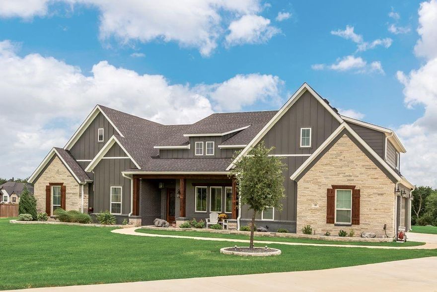 Experience serene country living at its finest in the beautiful Cross Fence neighborhood. This 5 bedroom 4.5 bath hidden gem is tucked away on a 1.6-acre cul-de-sac lot and offers several unique features adding versatility for your lifestyle! You will find a dedicated In-Law or 2nd Primary Suite which includes an ensuite bath, a sitting area, and its own entrance to the screened porch—ideal for multi-generational living. In addition to the 3-car attached garage, discover an oversized 4-car detached garage for a total of 7 cars. Whether you are a car enthusiast, a woodworker, or need a man cave or craft studio, this space offers endless possibilities. An extra parking pad on the side easily accommodates 4 additional vehicles. There is a bonus room upstairs complete with a dry bar and a half-bath, creating the perfect atmosphere for movie nights or game day. The back patio has been extended and screened ideal for the enjoying outdoor evenings in comfort. The heart of the home is a chef’s dream kitchen, perfect for enjoying family get togethers or entertaining and features an expansive island, elegant, coffered wood ceilings, double ovens, a gas cooktop, and ceiling height cabinetry. The oversized Primary Suite serves as a true sanctuary, featuring a slider to the screened patio and a spa-like ensuite with a standalone soaking tub and a massive walk-through shower with dual showerheads. With a freshly painted interior and a new roof in 2025, this beautiful home is move-in ready and is a rare find!
