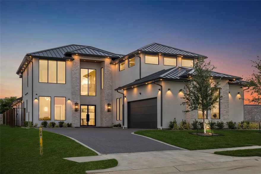 Step into this refined luxury home newly constructed by Manorstead Custom Homes nestled in the exclusive gated enclave of Avadene at Las Colinas. This architectural gem features 5 ensuite bedrooms and 7 baths, seamlessly blending upscale design with functional elegance. Open-concept main floor with soaring 24-foot foyer ceilings and 12-foot ceilings throughout. Gourmet chef’s kitchen with quartz counters, full-height quartz backsplash, and top-tier Jennair appliances including a fridge and freezer, range, 3 ovens, microwave, dishwasher, and 3 wine fridges. Butler’s pantry with a second refrigerator and custom storage. Primary retreat with spa-style ensuite bath and boutique walk-in closet. Private guest suite on the main level with full ensuite bath. Custom white oak staircase with metal railings. Dedicated study and expansive laundry room with full built-ins. Second-floor entertainment wing: Media room with immersive surround sound, game room with wet bar and wine fridge, family room, and 3 additional ensuite bedrooms. Convenient second-floor powder room. Oversized covered patio with full outdoor kitchen and professional-grade appliances. Three-car garage with a wide driveway accommodating up to 5 additional vehicles. Professionally landscaped yard with ambient lighting. Fully integrated Control4 home automation system. Comprehensive security system with CCTV. Smart lighting and audio and visual control. Community with scenic walking trails, pickleball courts, and a central mail center. Gated access for enhanced privacy. Quick access to DFW & Love Field airports, and major highways 635, 114, and 161. Nearby Attractions. Water Street development, Toyota Music Factory, Las Colinas Country Club, The Nelson Golf & Sports Club, and the expansive Campion Trails. This home is a rare opportunity to own a one-of-a-kind architectural masterpiece in one of DFW’s most desirable new communities. Designed for those who value craftsmanship, comfort, and connection.