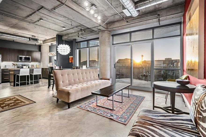 Claim your perch in The Cedars, a dynamic urban neighborhood proximate to every Dallas highway, the Arts District and three of the best Magnet high schools in Texas, all accessible by DART. This rarely available West corner unit includes a panoramic view of downtown and front row seat to the Cedars Bark Park.  

Enjoy sweeping skyline views through floor-to-ceiling windows in both bedrooms and the living area with plenty of wall space for large scale artwork. Updates include: remodeled kitchen featuring high end granite and custom-built island providing a second seating area and additional drawer and cabinet storage; new sink, faucet, garbage disposal; new stainless steel microwave, range and dishwasher; and painted cabinets with custom pulls. Remodeled bathrooms feature custom glass shower doors, new tile and shower head; high end double sink area with new granite, sinks and fixtures; new mirrors and lighting; and re-plumbed toilets. Lighting has been added in both bedrooms, updated track lighting and spotlights artwork, kitchen prep area and reading area; high end lighting fixtures added above the dining area and kitchen sink. The unit has two seating areas for relaxing and entertaining, including a library and stereo area. With ten-foot ceilings, an open floor plan and large balcony, this loft is ideal for entertaining — imagine hosting your own New Year’s Eve fireworks watch party! Community amenities include: resort-style pool with heated spa, two community grills, a fire pit and covered seating area on deck overlooking the city. Private dog run and next door neighborhood dog park with a third of an acre to run and play.

The Cedars offers both a quiet, walkable neighborhood feeling and access to vibrant arts and music venues in Downtown, Farmers Market, Victory Park, Trinity Groves, Deep Ellum and Arts District. From opera to hockey, pop music to visual arts, The Cedars is 1-2 miles from all of the action and a wonderful neighborhood to call home.