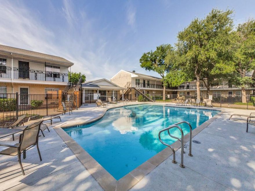 Welcome to 5818 E University Blvd #138—an updated, first-floor condo in the heart of Dallas’ vibrant Upper Greenville neighborhood. This inviting home blends comfort, style, and walkable convenience in one of the city’s most desirable areas.

Inside, you’ll find a bright, open-concept layout with hand-scraped hardwood floors flowing throughout the main living spaces. The spacious living and dining areas are perfect for relaxing or entertaining, with large windows overlooking a peaceful, tree-lined courtyard that fills the home with natural light. The kitchen opens seamlessly to the living area, creating an easy, functional flow.

Both bedrooms are generously sized and feature private en-suite bathrooms with ample counter space, offering flexibility for roommates, guests, or a home office setup.

Location is a true highlight. Enjoy walking distance to Central Market, plus a variety of popular restaurants, coffee shops, and boutiques along Greenville Avenue. You’re also just minutes from Southern Methodist University and have convenient access to the DART Rail, making commuting simple.

Community amenities include a sparkling pool and a landscaped courtyard with grilling areas—perfect for enjoying the Texas lifestyle. HOA dues cover water, sewer, trash, and exterior maintenance for easy, low-maintenance living. The unit also includes one assigned covered parking space, ample additional guest parking and convenient ground-floor access. HVAC system was replaced in 2025 and all appliances (washer, dryer, refrigerator) will convey with the property.

A fantastic opportunity to enjoy comfort, location, and lifestyle all in one.