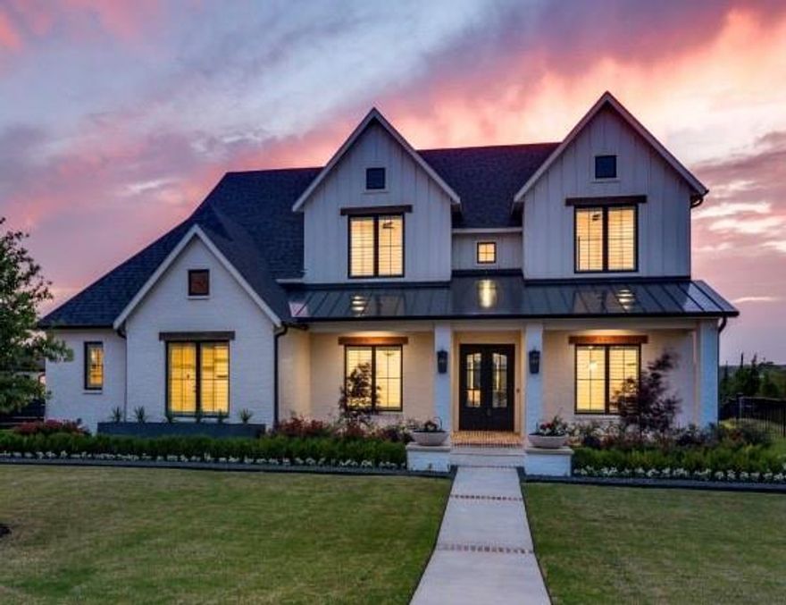 BEST VIEW IN ROCKWALL COUNTY! Experience unparalleled luxury in this stunning modern farmhouse, built in 2022 and thoughtfully designed with exceptional attention to detail. Perfectly positioned in Heath, this home offers breathtaking sunset views paired with sophisticated living at its finest. 

Featuring six spacious bedrooms - all en-suite with walk-in closets and custom built-in dressers - this home seamlessly blends comfort and elegance. The primary suite and two additional bedrooms are conveniently located on the main level, offering both privacy and functionality.

At the heart of the home, a chef's dream kitchen showcases premium Thermador appliances, marble countertops, and designer details.

Designed for both relaxation and entertainment, the home includes a hidden bookshelf entrance leading to a speakeasy-style media and game room.  A reinforced storm-safe closet adds peace of mind, while numerous thoughtful upgrades enhance both beauty and practicality throughout.

Step outside to your private resort-style retreat, complete with beautifully landscaped grounds, a heated saltwater pool with spa and waterfall, and an expansive outdoor living area featuring an outdoor kitchen and dining space - perfect for hosting year-round.

Additional highlights include two garages with epoxy flooring, including a dedicated boat garage and workshop space.

This is a rare opportunity to own a meticulously crafted home where no detail has been overlooked - truly a one-of-a-kind home in Heath.