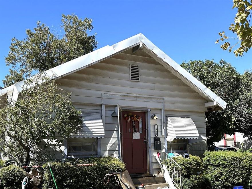 A spacious 3-bedroom, 1.5-bath home offering 2,096 square feet of living space in the heart of Wichita Falls. This property features a solid foundation and an inviting layout, ready for updates to reflect your personal style. Behind the main home sits a separate small unit with a large open room and private bathroom. With a little TLC and creative vision, this property can be transformed into a warm and beautiful home tailored to your needs, while also offering excellent long-term potential.
