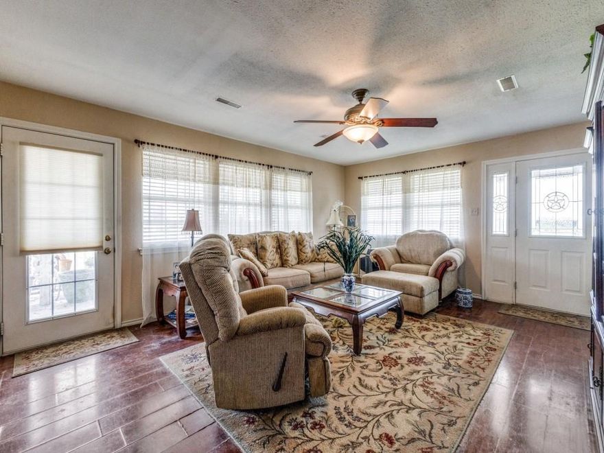 Surrounded by a mix of hardwoods and open pastures, the home sits on top of the hill. On the main floor there the main bedroom with a full bath, a spare bath, and a den, dining room, and kitchen, with a full wrap around porch. Upstairs, there are two bedrooms, each with full bathrooms, and an attic door leading to a crow’s nest with 360-degree views of the area. The house also has a full basement, finished with a bedroom, office, media
room, and lots of storage. There are several sheds for tools or workshop space, and a covered parking for tractors or equipment.

The south east corner of the property has dense hardwoods that are full of wildlife. The north east portion of the property is a rolling pasture that is great for grazing, and the remainder is a good mix of grass pasture with clumps of hardwoods and brush for wildlife cover. There are two small ponds on the property.