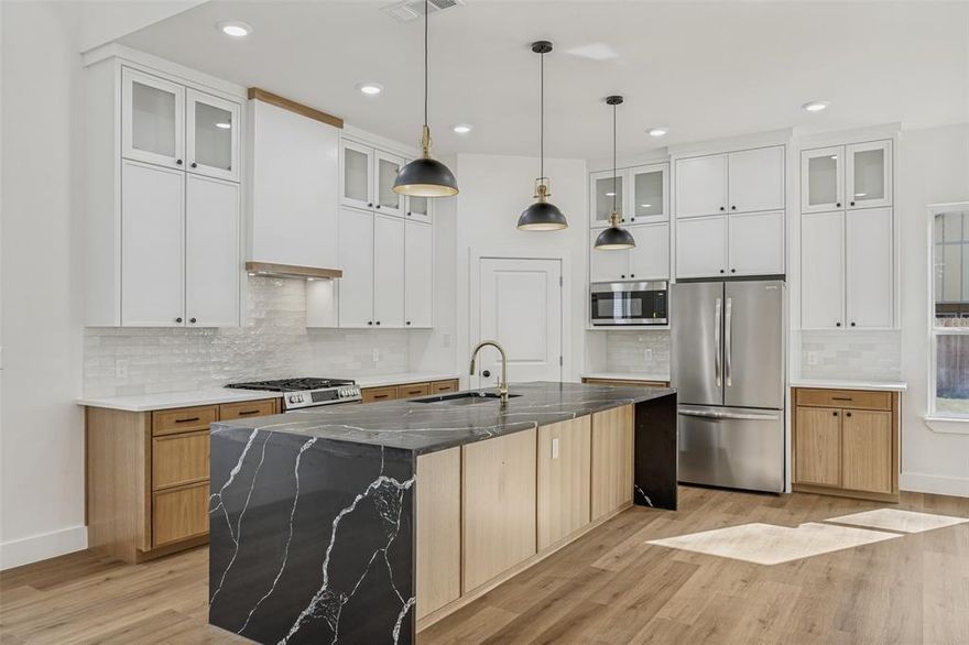 Just completed in 2026, this stunning new construction home blends elevated design with everyday functionality. Featuring 4 spacious bedrooms, one perfectly suited as a private study, this home offers a versatile layout to fit your lifestyle.

Step inside to soaring ceilings, an abundance of natural light, and a seamless open concept design ideal for both entertaining and daily living. The gourmet kitchen is a true centerpiece with custom cabinetry, stainless steel appliances, gas range, and an oversized walk-in pantry, all flowing effortlessly into the main living and dining areas.

A second living space adds flexibility and charm, complete with a stylish wet bar or coffee bar perfect for hosting or unwinding. Thoughtful touches like extra storage throughout and walk-in closets in multiple bedrooms ensure everything has its place.

The primary suite feels like a private retreat, featuring spa inspired finishes and an oversized closet designed with exceptional storage in mind.

Enjoy outdoor living on the covered patio, complete with a gas line ready for grilling. With luxury finishes throughout and intentional design at every turn, this home offers the perfect blend of comfort, style, and modern living.