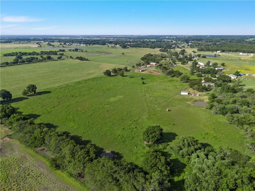Are you searching for the perfect blend of country living and city convenience? Look no further than this 7.87-acre property, providing endless possibilities for building your dream home. Whether you prefer a barn-dominium, ranch-style dwelling, or a luxurious brick/stone mansion, this land allows you to bring your vision to life. Take advantage of the opportunity to maintain horses or chickens for a fresh egg supply. Water and electricity are readily available to purchase. It's time to turn your dream into a reality. So, come on down and start enjoying the country life!