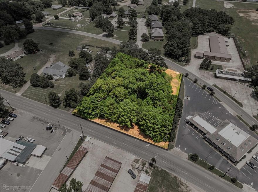 Incredible Commercial Opportunity in Prime Minden Location! Price enhancement!!  This highly visible commercial property offers approximately 1.11 acres of valuable real estate situated just off Interstate 20—one of the most heavily traveled corridors stretching from Texas to Mississippi across Northwest Louisiana. With main access from Sibley Road and additional egress onto Lee Street, this corner tract enjoys unbeatable exposure and accessibility, making it a premier location for your next business venture. Strategically positioned along the primary thoroughfare in and out of Minden, this site benefits from a constant flow of local and interstate traffic. Zoned B-3, it offers remarkable flexibility and supports a wide variety of commercial uses including, but not limited to: retail stores, restaurants, banks, medical and dental clinics, florists, bakeries, professional offices, hotels, convenience stores, and more. Whether you're launching a new startup or expanding an existing enterprise, this location offers endless potential for growth and visibility. 
Its proximity to major transportation routes, area businesses, residential neighborhoods, and essential services enhances its appeal even further. If you’ve been waiting for the right location to bring your business vision to life, this is it. Priced to sell and packed with potential—don't miss your chance to invest in one of Minden’s most desirable commercial sites. Schedule your private showing today and take the first step toward making your business goals a reality!