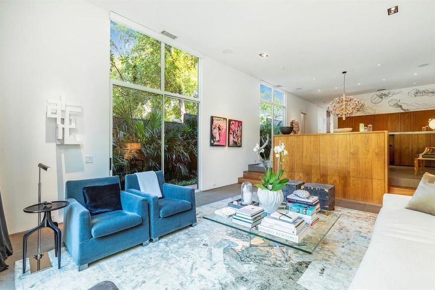 This architecturally significant modern residence by Lionel Morrison with interiors by Brant McFarlain offers 2,366 sqft of refined living in prime Knox Henderson. This 2 bed, 2.5 bath home with a designated office or library showcases exceptional custom features and luxury finishes throughout.

A dramatic skylit entry reveals walnut stairs, a glass enclosed powder bath, and a library or office with custom floor to ceiling cabinetry. The tiered layout flows seamlessly from the chef’s kitchen with premium appliances to the dining area and into a striking living room with 12 ft ceilings and walls of glass overlooking the private pool and spa. Lutron lighting and automated shades enhance both comfort and ambiance.

The serene backyard and resort style pool create a private retreat, ideally positioned just steps from Knox Henderson dining, shopping, and everyday amenities. Offered for sale and for lease.