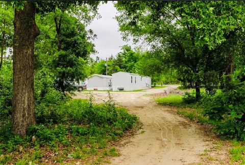 Photo of 300 W Rabbit Cove Road, West Tawakoni, TX 75474 (MLS # 21245234)