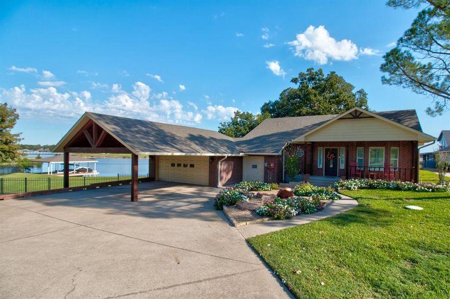 If you have been waiting for one of the best lakefront locations in Lake Kiowa to come available....This is It!  With 331 ft. of water frontage & nearly an acre lot, this is as good as it gets.  Located on a quiet cul-de-sac not far from the main entrance this home has panoramic views of the lake and of 3 golf holes!  Meticulously maintained & updated. Wonderful cook's kitchen with large prep island, extra large pantry, double ovens, granite countertops , wine fridge, and to the ceiling cabinetry all less than 8 years old. Extra large living area with gas log fireplace plus extra living space in a large sunroom.  Outdoor covered trex decking spans over 80 ft. around the side and back of the house ending at a wonderful outdoor kitchen area.  Porcelain wood-look tile throughout the house with carpet in bedrooms. Plantation shutters. Oversized garage with room for 2 vehicles plus golf cart plus extra covered parking under carport. Dock decking is also trex & has boat lift & jet ski lift.