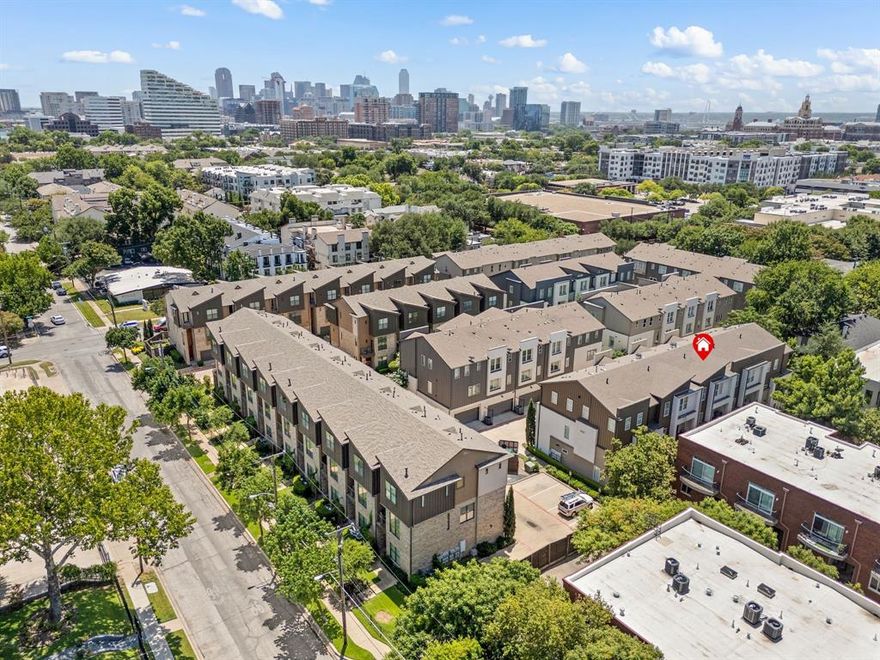 Experience luxury effortless living in the heart of Oak Lawn! This beautifully maintained three-story home offers the ultimate lock-and-leave lifestyle with an attached, oversized two-car garage with epoxy floors and is conveniently just minutes from Dallas Love Field, vibrant shops, and top dining. With water, gas, and utilities included in the HOA, you’ll enjoy true peace of mind and low-maintenance living and this HOA also includes a beautiful, glistening, gated community pool. Step outside to your private covered balcony, framed by mature trees and overlooking a serene community courtyard. Inside, the open-concept layout features hardwood floors, granite countertops, stainless steel appliances, and an eat-in kitchen with a large island and tons of storage options. A first-floor guest retreat with a bedroom and full bath provides privacy for visitors, while the third floor boasts the spacious primary suite with brand-new carpet, a walk-in closet, and an additional bedroom with bath. From comfort and convenience to location and amenities, this Oak Lawn gem truly has it all!