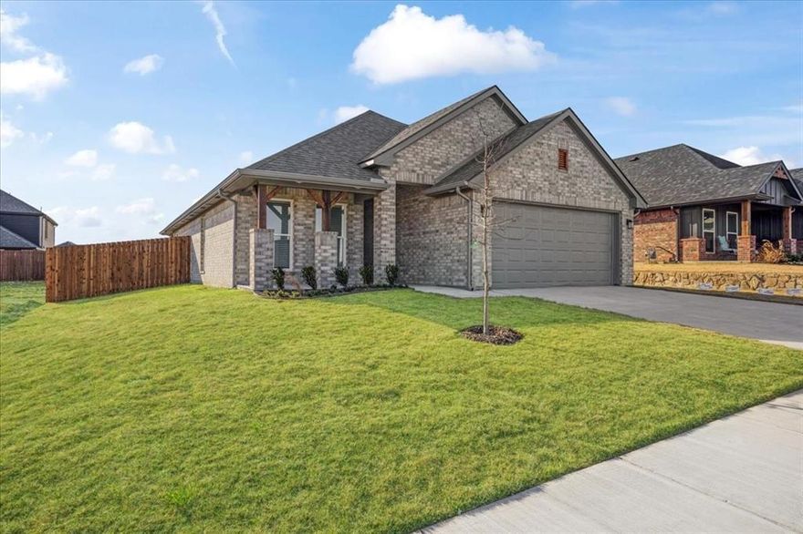 New construction offering 4 bedrooms, 2 baths, and a 2-car garage on a 60’ x 109.30’ patio lot. This 1,700 sq ft home features an open layout with 10-ft ceilings in the living area, LVP flooring in all living spaces and first bedroom, and carpet in remaining bedrooms.

The kitchen showcases Black Fox cabinetry, white Carrara quartz countertops, waterfall-edge island, white subway tile herringbone backsplash, under-cabinet LED lighting, and a full appliance package including range, dishwasher, disposal, and microwave. The primary suite includes a shiplap accent wall (to be repainted), tiled walk-in shower with frameless glass door, double vanity, decorative mirrors, and black matte fixtures. Guest bath offers a tile surround tub with shampoo niche.

Additional features include a 5-panel glass entry door, black matte hardware, ceiling fans in living and all bedrooms, 2 inch faux wood blinds, Low-E dual-pane windows, tankless water heater, heat-pump HVAC, gutters, 25-year roof shingles, and two garage door remotes. Exterior highlights include full sod, trees front and back, landscaped beds, full irrigation, and a pre-stained 6-ft privacy fence. HOA $450-year, no amenities.