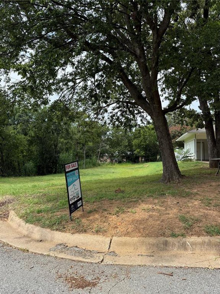 Centrally located, the property provides easy access to schools, major highways, and Denison’s award-winning Main Street—a hub for shopping, dining, and community gatherings. Nestled within an established neighborhood, this spacious lot blends tranquility with modern convenience. Rarely do lots like this become available—don’t miss your chance to own a desirable piece of Denison!
City utilities available (buyer to verify tap fees)Prime opportunity in the heart of Denison! This improved cul-de-sac lot measures approximately 150 feet deep by 75 feet wide, offering ample space to bring your vision to life. With a charming creek and mature trees bordering one side, you’ll enjoy natural beauty and privacy as you design your dream home or investment property.

Contract Clause - Legal Clarity The property is an improved lot located within the city limits of Denison, Texas, with public water and sewer available at the street. Buyer acknowledges that utility taps and meters may not be installed and agrees to independently verify utility connection costs and requirements with the City of Denison.

Information is deemed reliable but not guaranteed. Buyer and Buyer’s Agent to verify all details, including lot size, utilities, and zoning.