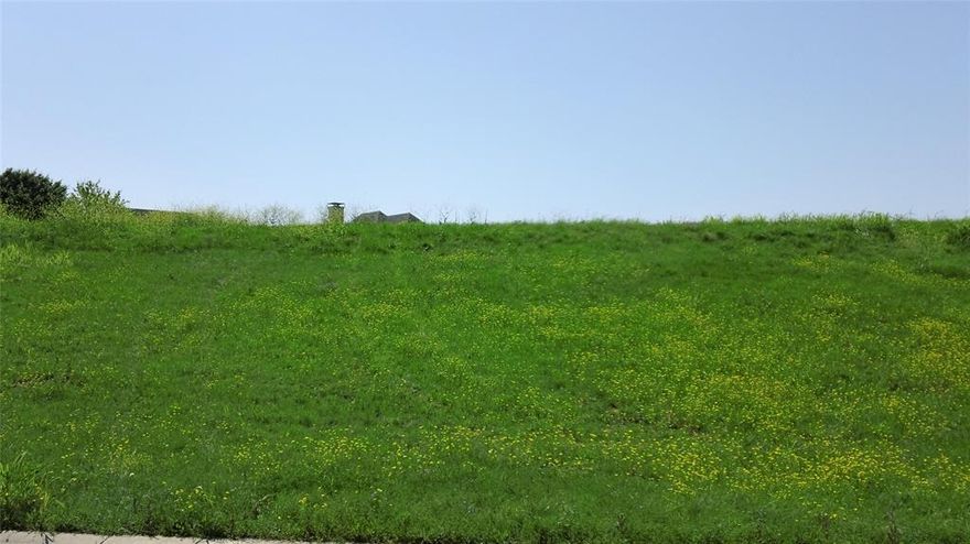 Luxury undeveloped residential lot. Land only. The lot is located within a fully developed luxury neighborhood. Lot is very unique. Capable of supporting a house that is 15,000+ square feet. And capable of supporting a full basement, with drive-in vehicle access from both the front or back of the property. Utilities are ready for new construction build. An absolutely one-of-a-kind offering in the elegant Castle Hills development in Lewisville, TX. Frontage of lot faces a beautiful four acre greenbelt lake and park. Park is developed but has many future artistic additions possible. Truly an opportunity to build a castle-like home designed for relaxation, entertaining, and great access to the best places and things to do in DFW.. Conveniently located near the best shopping, dining, airports, along with recreational and entertainment amenities. The lot is build-ready. Bring your preferred builder. Build at your own pace. No country club membership mandate. Again, it's an exceptional build opportunity in an exceptional location.