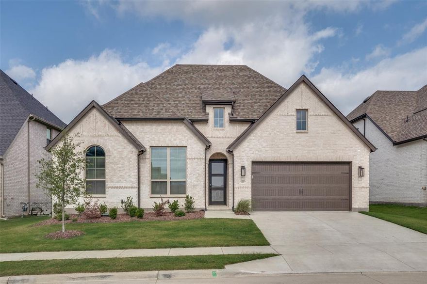 This stunning one-story plan offers modern living. Large windows in breakfast nook and living room with sliding doors fill the home with natural light. The heart of the home features an open-concept kitchen with a large island seamlessly connecting to the dining area and living room, which opens onto a patio for outdoor enjoyment. The private primary suite has oversize shower with dual shower head, rainfall and handheld shower heads. Two secondary bedrooms with private bathrooms. An office provides flexibility as a fourth bedroom or playroom if needed. An entertainment room adds versatility, ideal for relaxation or gatherings. The oversized 3-car tandem garage offers additional storage. The Canterbury floor plan was built by Highland Homes in 2025, Located within the highly rated Northwest ISD schools, this home combines comfort, style, and convenience in one perfect package. One year warranty until Nov 2026, two-year mechanical, ten-year structural.