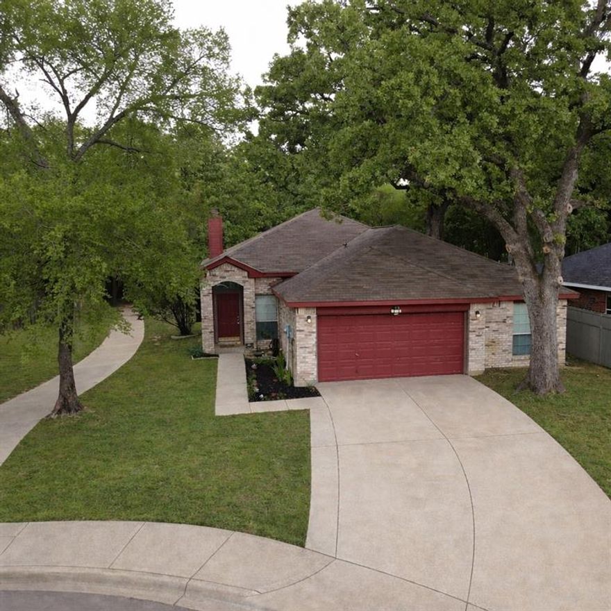 Check out this floor plan! Very open with 2 living areas and 4 bedrooms, all for under $300,000.  Great for entertaining, a large family or just room to spread out.  This well maintained home is on a cul-de-sac, has beautiful large mature trees and backs up to a nice park area with a walking trail, benches, swings and basketball court. Great location, just a 20 minute drive to downtown Dallas.  Seller is motivated, come see this one!
Pool table and refrigerator are both negotiable.