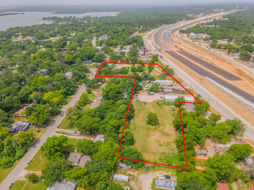 Desirable property on Jacksboro Highway Frontage Road only minutes from Eagle Mountain Lake. Offers Versatile and unique opportunity for many kinds of development. All utilities available. This expansive lot provides flexibility, ideal for your business ideas or custom projects. This lot is perfect for investors or builders looking to capitalize on Fort Worth's growth in that direction and to the lake. Prime property that is only a block from Casino Beach.
This property offers endless potential in a growing area. Survey is available. Ready for new owner to invest in an area that is growing.... Additional parcels included in the sale are 00870900, 04523946 4.818 acres according to tax records