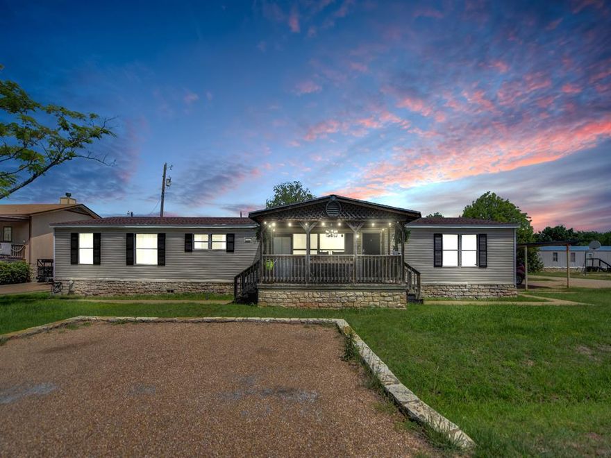 Welcome to 5402 Clear View Drive, a spacious retreat nestled in the peaceful Arrowhead Shores community of Granbury. This 4-bedroom, 2-bath home offers over 2,000 square feet of comfortable living space on a generous lot, blending functionality with relaxed Texas charm. Featuring an open-concept layout, the home includes multiple living and dining areas ideal for entertaining or everyday living. The kitchen offers abundant counter space, granite surfaces, and a large island that flows seamlessly into the main living area, creating a warm and inviting atmosphere. The split-bedroom design provides privacy for the primary suite, while additional bedrooms offer flexibility for guests, a home office, or growing families. Enjoy outdoor living with a spacious backyard featuring deck and patio space perfect for gatherings, relaxing evenings, or weekend barbecues. Located near parks, lake access, and neighborhood amenities, this property offers the perfect balance of small-town charm and convenience. Just minutes from historic downtown Granbury, shopping, dining, and the scenic shores of Lake Granbury, this home is a fantastic opportunity to enjoy peaceful living with easy access to everything Granbury has to offer.