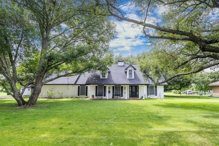 Beautiful two-story home on a large lot with mature trees. This property has 4 bedrooms as well as two full bathrooms. The master bedroom is downstairs with the other rooms upstairs. If you are looking for a place to bring your family, pets, toys, etc, this is it.