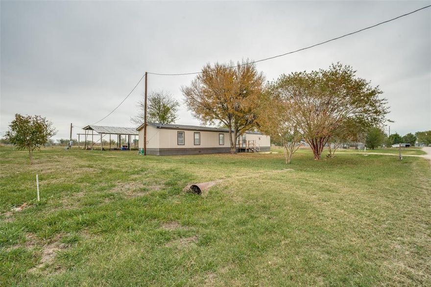 This property features 2.521 acres and a cozy Single-Wide mobile home. The home features new paint and an open floor plan with upgrades. The backyard has a pavilion with many possibilities (RV parking or patio).  The barn needs some TLC ready for chickens, horses, or cows.
The location is excellent, minutes from I-20.