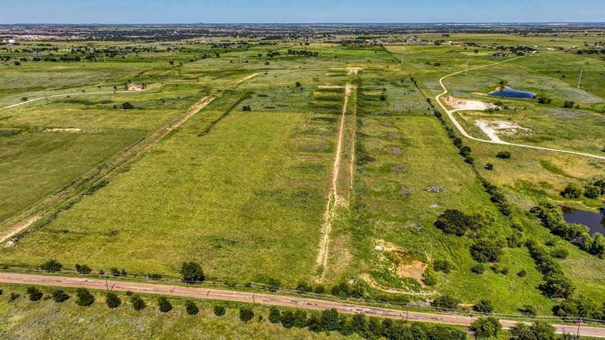 Discover over 50+ acres of prime land in the highly desirable Godley ISD! Located less than 10 minutes from Godley schools, this expansive property offers exceptional convenience and endless possibilities. With easy access to HWY 171, you can enjoy seamless connectivity while immersing yourself in the tranquility of Johnson County.
 
This versatile acreage is perfect for a variety of pursuits—whether you're dreaming of building your custom estate, establishing a premier horse facility, creating a scenic ranch, or developing a thoughtful community. The land features a stunning mature tree canopy complemented by spacious open pastures, ideal for grazing cattle, horses, or simply enjoying the peaceful countryside.
 
Several beautiful building sites provide the perfect backdrop for your future home or development project. The property also includes a stock tank and a 3-acre pond, adding to its charm and practicality. Just 30 minutes from Fort Worth, this serene retreat offers the best of country living with easy access to urban amenities.
 
Don’t miss this rare opportunity to own a remarkable piece of Parker County—where your vision can become reality. Whether for personal use or development, the possibilities are truly limitless. Txt keyword GODLEY3 to 88000 for Survey & more.