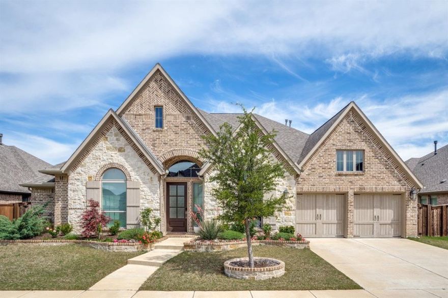Discover this exceptional and rare single-story home, meticulously maintained and situated on a premium lot backing to a serene, protected green space. The thoughtfully designed open floor plan offers a perfect blend of space and functionality, featuring a dedicated study, media room, and a show-stopping dining room beautifully transformed into a custom Scottish pub. A split-bedroom layout ensures maximum privacy, including a secondary bedroom with a full en-suite bath—ideal for guests or older children. This home is packed with premium upgrades, including rich wood floors, soaring 14-foot ceilings, elegant quartz countertops, custom cabinetry, and designer lighting throughout. The light-filled family room, anchored by a stunning fireplace, creates a cozy and inviting space for gathering. Culinary enthusiasts will love the well-appointed kitchen, complete with a large island, 5-burner gas cooktop, double ovens, an oversized walk-in pantry, and a convenient butler's pantry. The extended primary suite offers a peaceful retreat with a cozy sitting area, garden tub, separate glass-enclosed shower, dual vanities, and two expansive walk-in closets. Step outside to the covered back patio where you'll enjoy peaceful green space views, with plenty of room to add a pool or create your own backyard oasis. The three-car garage features epoxy flooring and ample storage space for all your needs. As part of a highly sought-after, family-friendly community, the HOA cares for your front yard, ensuring your home always looks its best. Plus, enjoy the convenience of high-speed internet as part of the community's amenities. The location is unbeatable, within walking distance to top-rated schools, and just moments from the resort-style amenities, including a clubhouse, fitness center, pools, splash pad, dog park, scenic walking trails, and a year-round calendar of community events. This home offers the perfect combination of convenience, luxury, and lifestyle for a growing family.