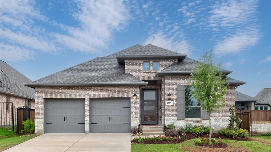 Extended entry with 13-foot ceiling leads to open kitchen, dining area and family room. Kitchen offers generous counter space, a 5-burner gas cooktop, corner walk-in pantry and inviting island with built-in seating space. Dining area flows into family room with a wood mantel fireplace and wall of windows. Game room with French doors just across from kitchen. Primary suite includes double-door entry to primary bath with dual vanities, a freestanding tub, separate glass-enclosed shower and two large walk-in closets. Secondary bedrooms feature walk-in closets. Covered backyard patio. Mud room off two-car garage.