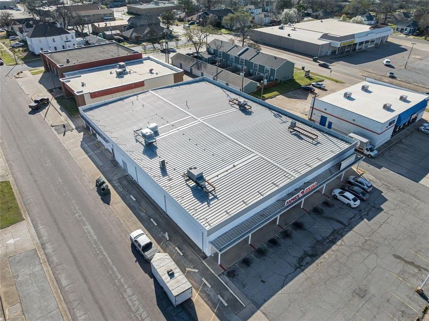 Here is an excellent opportunity to own a large income producing property located in the heart of Denison. This building is comprised of three unique units, the first of which has been occupied by Family Dollar since 1994 (200 S. Armstrong). The other unit that faces Armstrong is over 6,400 sqft of vacant retail space with warehouse in the back (210 S. Armstrong). The third unit, which fronts Chestnut Street, is 2,400 sqft of recently updated space that is well suited for a retail business or an office (714 W. Chestnut). The building was recently painted and the roof has been inspected. Commercial zoning allows for a wide variety of uses including retail, grocery, restaurant, and office. The building has excellent visibility from Armstrong Ave (~7,600 vehicles per day), and is located on the edge of historic Downtown Denison. Call today to schedule a showing.