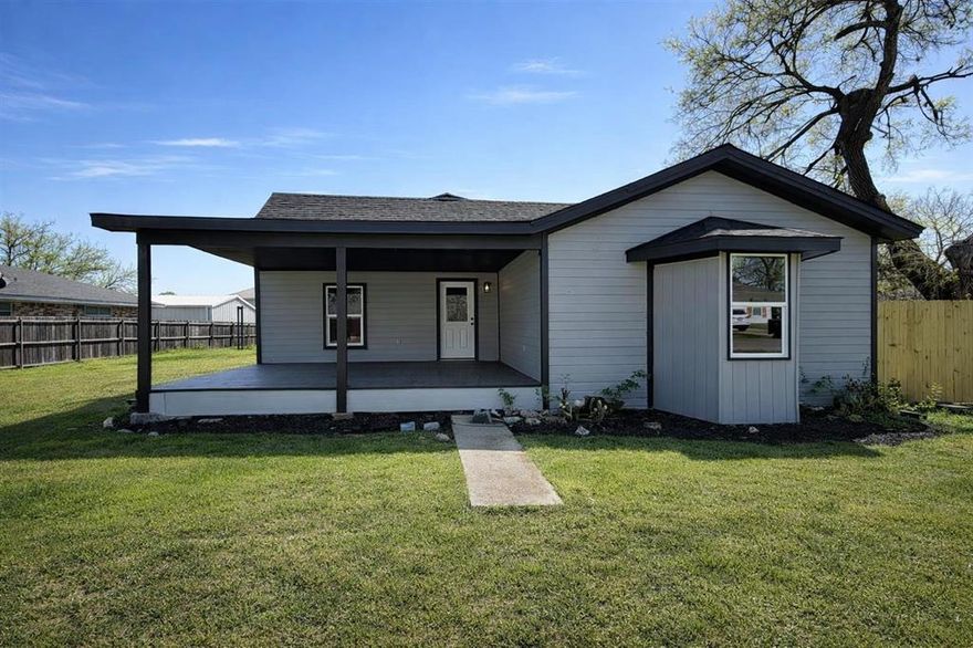 The open-concept floor plan features a bright living area with updated flooring, recessed lighting, and elegant fixtures. The kitchen showcases new cabinetry, quartz countertops, stainless steel appliances perfect for entertaining. Each bathroom has been beautifully redesigned with contemporary tile, new vanities, and modern finishes.

The primary suite offers a spacious retreat with an en-suite bath and generous closet space. Additional bedrooms are versatile for family, guests, or a home office setup.

Situated on a large lot, the property provides ample space for outdoor living, gardening, or recreation. An additional storage building in the back adds valuable utility for tools, equipment, or hobbies.

Located in the desirable West Fulton Addition subdivision, this home offers easy access to schools, shopping, and major highways — combining small-town charm with convenient proximity to the metro area.