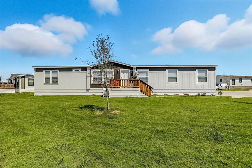 Discover modern comfort and spacious living in this beautifully designed 4 bedroom, 2 bath manufactured home located in the heart of Wilmer, TX. Built in 2024, this home is practically brand new and features a generous 2,085 square feet of open concept living space. Perfect for families, entertaining, or working from home. Inside, you’ll find a bright and open floor plan, complemented by an additional bonus room that was recently added, ideal for a home office, playroom, or guest space. The layout flows seamlessly from the living area to the kitchen and dining space, providing both functionality and style. The home offers an affordable opportunity to own a spacious and modern home in a rapidly growing area. Located just off I-45, commuting is a breeze with only a 22 minute drive to Downtown Dallas. Enjoy the perfect balance of quiet, suburban living with easy access to all the amenities, entertainment, and employment opportunities the city has to offer!