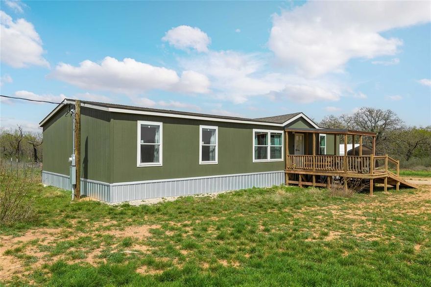 Peaceful country living just minutes from town! Located at 496 County Road 198 in Brownwood, Texas, this 2023 manufactured home offers the perfect blend of modern comfort and wide-open space. Featuring 1,792 square feet, this 4-bedroom, 2-bathroom home boasts a spacious open-concept layout designed for both everyday living and entertaining. The heart of the home is the large kitchen, complete with a central island, ample cabinetry, and seamless flow into the dining and living areas—creating a bright and inviting space for gathering with family and friends. The split-bedroom arrangement provides privacy, with a comfortable primary suite and well-sized secondary bedrooms. Thoughtfully designed with modern finishes and functionality in mind, this home is truly move-in ready. Situated on 10.58 acres outside the city limits, you’ll enjoy the freedom and tranquility of country living with plenty of room for animals, recreation, or future improvements. Conveniently located just a short drive from both Bangs and Brownwood, you get the best of rural serenity without sacrificing accessibility. If you’ve been looking for acreage, a newer home, and space to spread out—this property checks all the boxes!