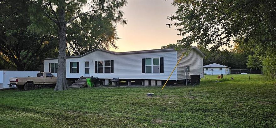 Don’t miss this opportunity! Almost new mobile home! Price just dropped, ready to sell!

This nearly new manufactured home sits in a quiet neighborhood conveniently just outside the city limits and right next to the schools. Built less than a year ago, it features an open floor plan with a spacious living area and kitchen perfect for gatherings.

The owner had begun upgrades including plans for a cedar skirt, front porch, and a remodeled back bedroom with a large closet—giving the new owner a head start on finishing touches. Large storage building with electric and on has a wall unit (14x30) and an A-frame doghouse also convey with the property.

With so much potential at an incredible value, this property won’t last long—schedule your showing today!