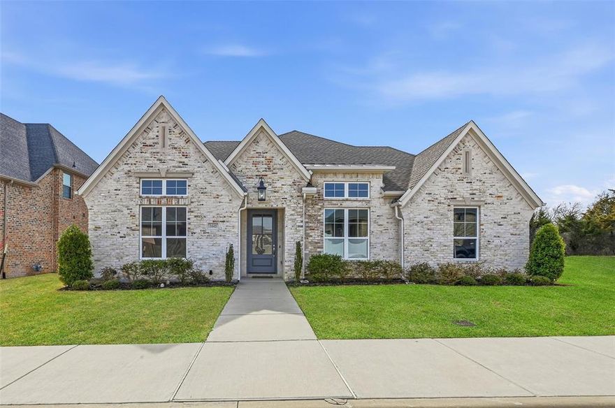 Thoughtfully designed and beautifully appointed, this exceptional home offers elevated finishes, flexible living spaces, and effortless comfort in the heart of rapidly growing Midlothian with convenient access to Dallas, Fort Worth, and DFW Airport. Built by respected local builder Bluestone Homes of Texas, known for quality craftsmanship for over four decades, this residence showcases attention to detail throughout. The open, light-filled layout features 3 bedrooms plus a study or optional 4th bedroom, 2 baths, high ceilings, and inviting gathering spaces perfect for everyday living and entertaining. At the center of the home, the chef’s kitchen showcases a large island, quartz countertops, Thermador gas cooktop, GE appliances including double oven with built-in microwave, custom cabinetry, and soft-close drawers. The private primary suite provides a relaxing retreat with soaking tub, separate walk-in shower, dual vanities, and his and hers walk-in closets. A cozy parlor or reading room adds warmth and charm, while a thoughtfully designed mudroom adds everyday ease. Energy-efficient foam insulation, low-E windows, smart wiring, full sod, irrigation, and beautifully upgraded landscaping complete the home. Located in charming, walkable Wickliffe Manor with access to a beautiful clubhouse, resort-style pool, and inviting fire pit. Schedule your showing today.