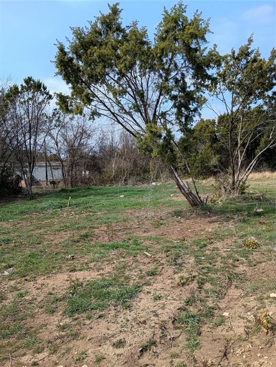 Vacant lot.  This lot has been beautifully cleared and is ready for your Buyer.  It is a lovely lot for a new home, which can be a manufactured home, mobile home, or brick home, etc., and can also be a 2-story home. An aerobic septic tank is permitted through Hood County for installation. Water and electric is available. Survey is attached. Buyer and Buyer's agent to verify accuracy of all information, including but not limited to: restrictions, utilities, etc.  The area is very lovely, warm, and inviting.  So much work has been added to this lot to enable Buyer to immediately have room to add a home to this lovely area.  The location of this property is very convenient, situated between Weatherford and Granbury. These two cities are within 20-30 minutes, making it a wonderful country setting with city benefits near by. Come by and see for yourself the beautiful area.