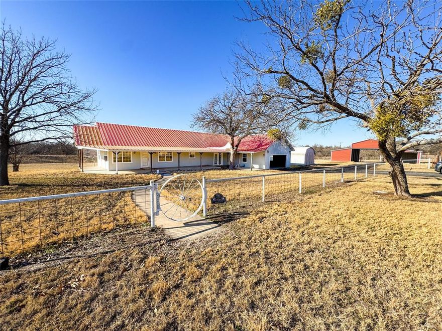 This property strikes the perfect balance—offering generous space in both the home and the land without feeling overwhelming or unmanageable. Located outside of Eastland, TX, this 3 bedroom, 2 bath home sits on a beautiful stretch of land overlooking a pond. The spacious den with vaulted ceiling is conveniently located off the kitchen & provides plenty of room for relaxing or entertaining. Enjoy a separate laundry room with shelving & a sink. The master suite boasts two oversized walk-in closets plus an ensuite bathroom with double sinks. Step outside onto the lengthy front porch or unwind on the back deck—both perfect for experiencing nature at its best. A very nice, giant storage building & drive-through, horizontal-roof barn add extra value, offering ample space for tools, equipment, or hobbies.
With just a little TLC & updating, transform this property into the country retreat of your dreams.