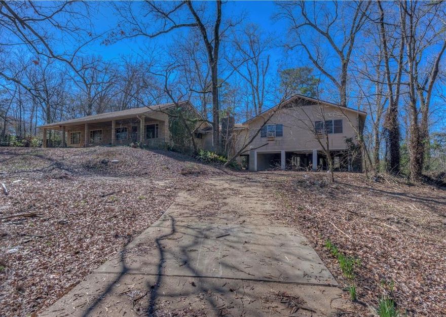 Great investment opportunity! 2.27 acres right by cross lake. This property will be great for an investor that wants instant equity and has a vision to do some remarkable renovations on this property. This home does offer a lakeside view of cross lake and allows quick access from the backyard! The property includes a home and a mother-in-law suite that consists a total of 5 bedrooms, 4 bathrooms, 2 fireplaces, 2 kitchens, and multiple living areas. This home is to be sold as is condition and cash offers only. Schedule a showing today!