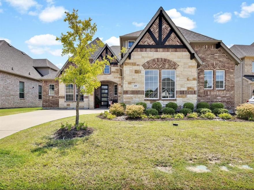 BUYER BONUS! SELLER TO PAY FOR A 2-1 RATE BUY DOWN WITH ACCEPTABLE OFFER!! Welcome to this beautifully crafted Pacesetter Home in the heart of Rockwall, designed to offer the comfort of a spacious single-story with added upstairs versatility. Three generously sized bedrooms are thoughtfully placed on the main level, each with its own ensuite bathroom, ensuring privacy and convenience for family and guests alike. The bright, open-plan living area is flooded with natural light, creating an inviting space ideal for both relaxed evenings and lively gatherings. The private owner’s retreat features a cozy sitting nook—perfect for a good book or a peaceful morning coffee—while a flexible downstairs room offers endless possibilities as a home office, study, or creative space. Upstairs, you’ll find a large fourth bedroom with an adjoining full bath, along with a cheerful game room and an expansive media room, perfect for film nights! An added bonus is the epoxy coating within the garage!
Nestled in a lively community, this home is just moments from the charm of downtown Rockwall, where residents enjoy the farmer’s market, seasonal events, and an array of local shops and eateries. For waterfront dining, entertainment, and leisure, The Harbor is just a short drive away, with Lake Ray Hubbard offering endless opportunities for boating, fishing, and outdoor fun. The community also provides access to a swimming pool and park. With easy routes to I-30 and HWY 66 and access to highly regarded Rockwall ISD schools, this property blends convenience, comfort, and lifestyle in one appealing package.