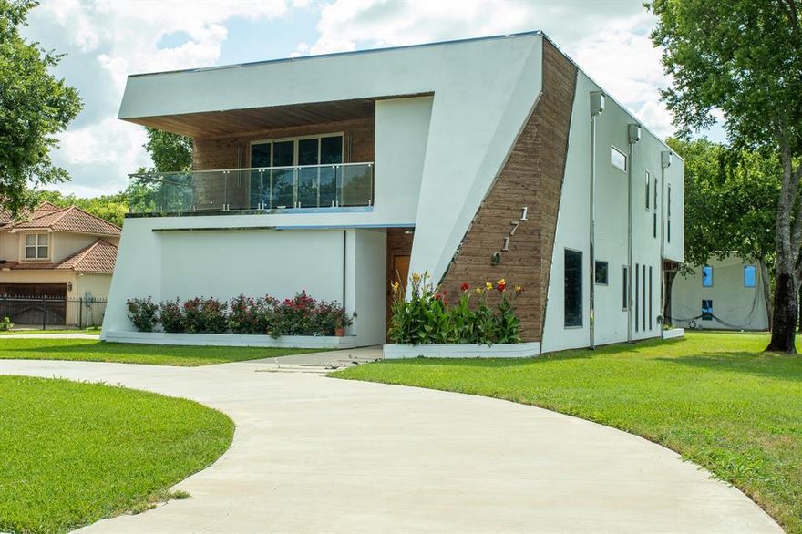 This distinctive contemporary home epitomizes modern architecture and luxury living. Its expansive open-plan interiors are bathed in natural light from floor-to-ceiling windows, complemented by motorized shades for privacy and comfort.Custom-designed on a sprawling 1-acre lot, this energy-efficient residence includes 4 bedrooms, 4 baths, a game room, exercise room, and study, plus flexible room-second office. Additionally, it features a detached 2 stories 2,400 SqFt building with space for 6 to 8 cars and 1,200 SqFt workshop. A focal point of the home is a striking spiral staircase adorned with metal and wood railings, blending functionality with aesthetic appeal.Luxurious amenities abound, such as an expansive balcony in the primary bedroom and a custom oversized master closet.Convenience and Accessibility, The custom-built elevator ensures effortless access to 2nd floor.The TPO roofing system provides durability and longevity with minimal maintenance, further elevating the home's appeal.This property features a range of wheelchair-friendly amenities.House qualify for 2 buy down program.