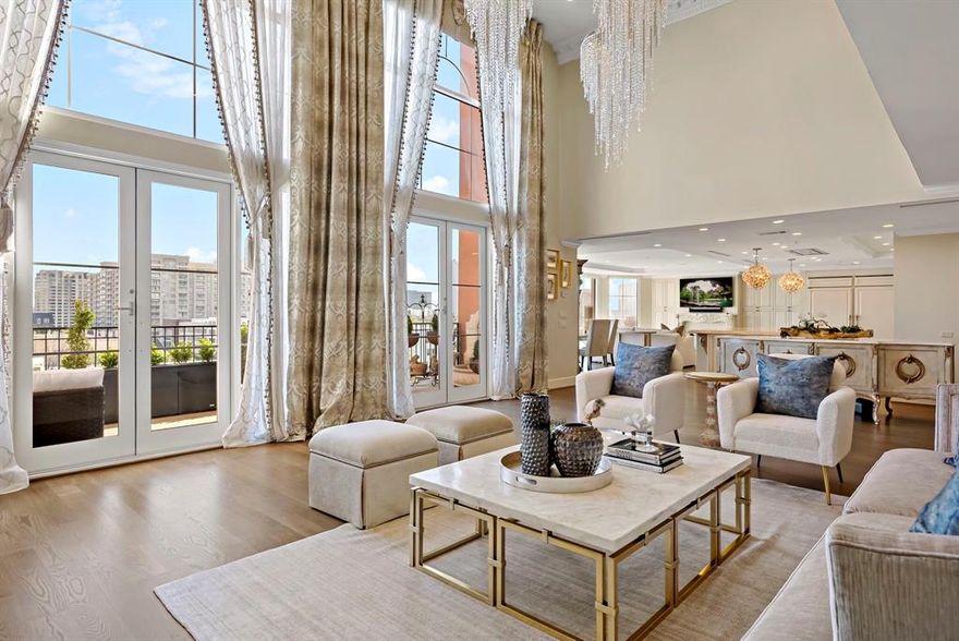 Reach new heights of luxury in this custom one-of-a-kind and fully renovated corner penthouse in the coveted Plaza I. Open floor plan with a vast living room with two-story fireplace, custom lighting and gorgeous views. Perfect For Entertaining. A second living and dining room off of the gourmet kitchen; equipped with superior appliances & wet bar with refrigeration, second office and large utility room with butler’s pantry.  Master down, ensuite bath with spa-like features dual sinks, jetted tub and spacious double shower. Upstairs, a balcony overlooks the impressive first floor, 2 additional bedrooms, 2 full baths, media room and main office.    This penthouse has 2 storage units & 3 dedicated parking spots. The high-rise offers security, valet and concierge services along with a resort-style pool and state-of-the art fitness centers. Experience this extraordinary and sophisticated lifestyle that living in Turtle Creek offers.