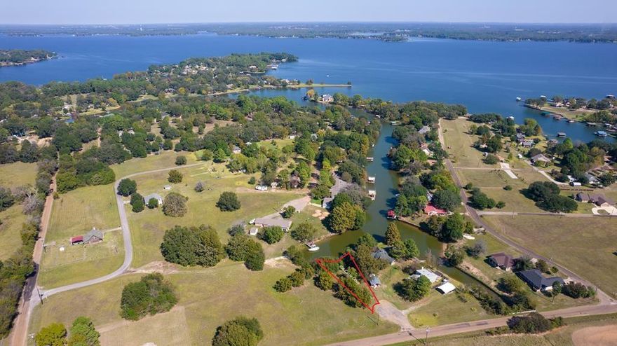 Thinking about building on this property. This land qualifies for special financing if you want to build on it. You can buy the land and build the house with one loan. Waterfront Lot in great location just next to boat launch. Location with nice waterfront homes so bring your building plans and build your waterfront dream home. Deed Restrictions for site built home only. Pie shaped lot with 109ft. of water frontage. New survey will be needed to establish boundaries.