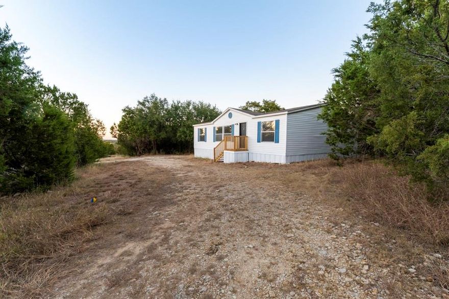 Charming fully remodeled 3 bedroom 2 bath home - Peaceful Country Living with No HOA! Discover your dream home in this beautifully remodeled 3-bedroom, 2-bath retreat just outside city limits. Enjoy the perfect blend of modern comfort and country serenity! Step inside to find an open, inviting layout featuring granite countertops, luxury vinyl plank flooring, brand-new carpet, and fresh paint throughout. Every detail has been thoughtfully updated for move-in-ready ease. Outside, the property offers plenty of space to roam, ideal for gardening, entertaining, or simply enjoying the peace and quiet of your private surroundings. With no HOA, you’ll have the freedom to truly make this home your own. If you’re looking for modern updates, quiet living, and room to breath, all without giving up convenience, this is the one you’ve been waiting for!