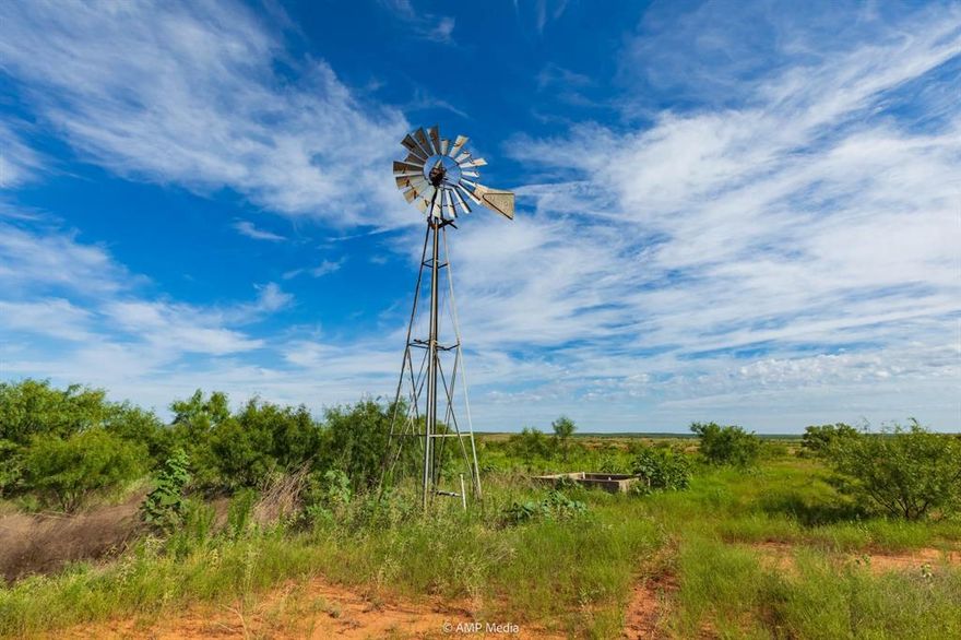 “bob-white” is the distinctive sound you hear as you pull up to the gate; the sentries of quail are out in full force to give you that unique West Texas Howdy. Their chorus of whistles creates peace that makes the Double Mountain view much more special. Quail aren’t the only ones that enjoy this area of Stonewall County, the wild hogs, Whitetail deer, dove, and much more flourish in this landscape abundant with water throughout. The Salt Creek South 320 offers all that you would expect in the great outdoors with uninterrupted views of iconic landscape, wildlife, water, and more stars than you can imagine. This is a full experience. Along the foothills of what early settlers used to guide their travels, this property has a landscape that rises in elevation to soak in those historic views. You’ll find the place functional too, with two large stock tanks  Perimeter fences are in good shape. The property has been managed over the years, so grass production is better than normal for the area. A variety of trees are thick in the canyon draws and around the surface water. The cover is very good with the landscape serving as travel corridors and the trees protecting those wild travelers. The open areas will be critical during rut season as the neighboring properties are thick with trees. Fawns can be found bedding down in the thick grass and find the property nice to run and play. Good size concrete trough can be found by the working windmill. Approximately 320 acres in Stonewall County, this acreage is considered pasture with improved grasses. The land is consider rolling which is a good fit for the Rolling Plains namesake in the area. With a good mix of topographical changes, the property gives you several looks as you work yourself across it. This is a fun property. Additional acreage is available.  Two canyons have been dammed up to create some significant bodies of water for that part of the world. The seller will reserve a utility easement along the west fence line.