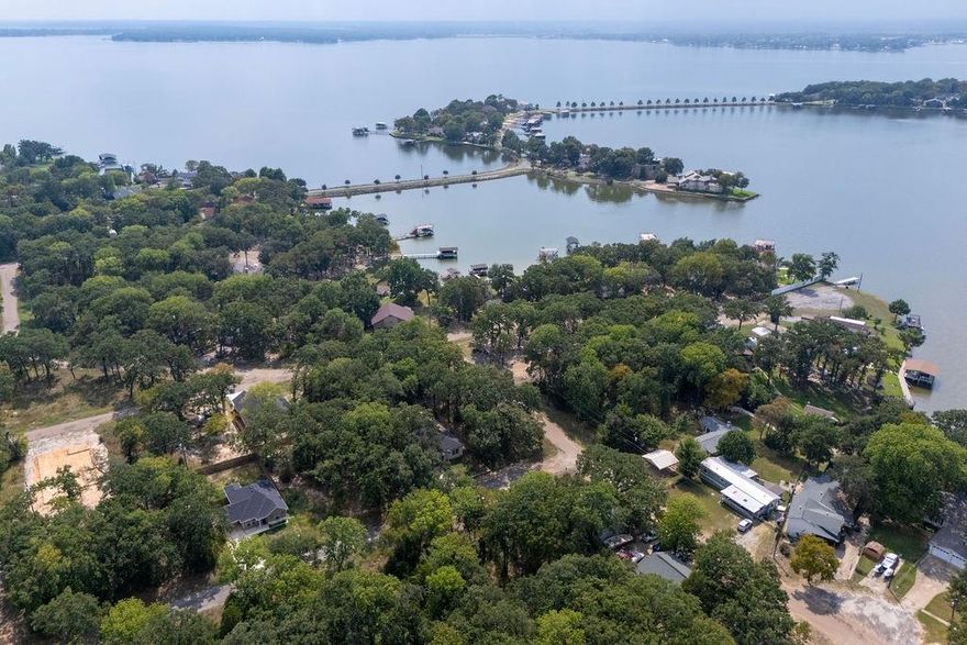 Gorgeous side by side lots, purchase one of both for your new home site. Walking distance to the lake, you can see it from the side of the white house. One power pole is on the property and electric is there, no meter. Make an offer today on your weekend dream home for your boat and tackle!
MLS Listing number 21077004 for lot next door.