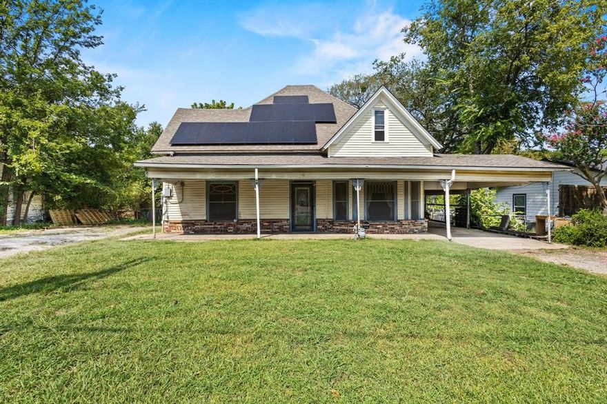Perfect investor opportunity located in the heart of Wolfe City. This charming old home features a three-bedroom, two-bath layout that is full of potential. The property is being sold as-is. Has an upgraded water heater and solar electric system.