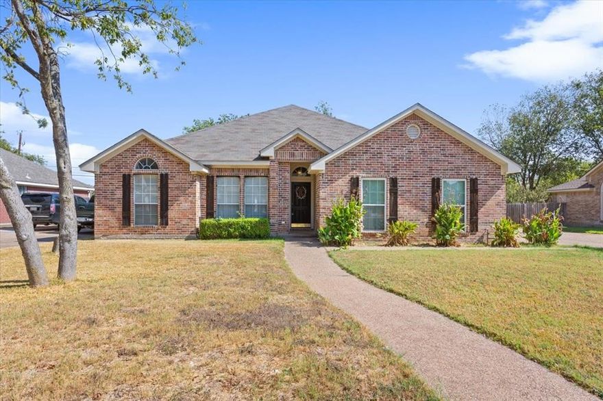 Located in sought after Midway I.S.D in Hewitt, Tx. This brick-built 4 bed 2 bath home has been beautifully kept! Step inside to the spacious living room and warm up by the fireplace in the winter months or cool off on the covered back porch during those Texas summers. Wood like ceramic tile throughout and raised ceilings add to the charm and flow of the home. The kitchen has updated marble countertops and bar top perfect for breakfast & lunch. The painted cabinets compliment the countertop and appliances. The dining area is nice & quaint with a big window view into the back yard. The primary bedroom is isolated on the right side of the home and features 2 closets and a large bathroom with shower enclosure and a separate tub. The other 3 bedrooms are located on the opposite side of the home. The front bedroom boasts a nice reading nook in front of a big window looking into the front yard with closets on each side. The other 2 rooms are a nice size with tall ceilings and ceramic tile and get a lot of natural light as well. Located just minutes from shopping, dining, entertainment and conveniently located near I-35 and Hwy 6. Schedule your showing today.
