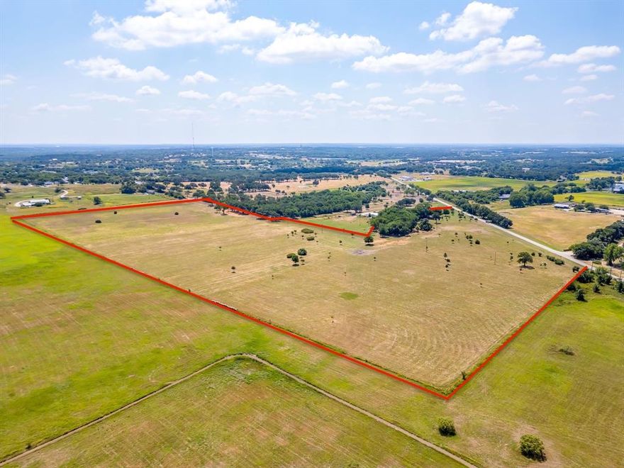 36.2 ACRES LOCATION ! LOCATION !!!!  Beautifully manicured and located just 3.2 miles from Downtown Weatherford Square , 3.5 miles from I-20 and 1.2 miles from HWY 180 off the Ric Williamson Loop! Just outside the city limits line,  come build your dream home and bring your horses and cattle ! The property is already AG exempt ! The property features elevated views of the southwest sunsets with mature Oak, Pecan and Elm trees! Wonderful  sandy loam soil with native coastal bermuda grass, excellent  perimeter fencing and an entrance gate from the 1030 ft of road frontage on Old Mineral Wells HWY! Electric available onsite . Don't miss this property it has been meticulously manicured ,  all under brush has been cleared from under the stunning trees , just beautiful to walk through with some of the most unique and largest trees I have seen on a property. Live close to town just across the city limits line and come build your dream ranch and home and sit on your patio and watch all the deer and wildlife as the sun sets! Seller will consider splitting the property into two parcels and selling separately!!