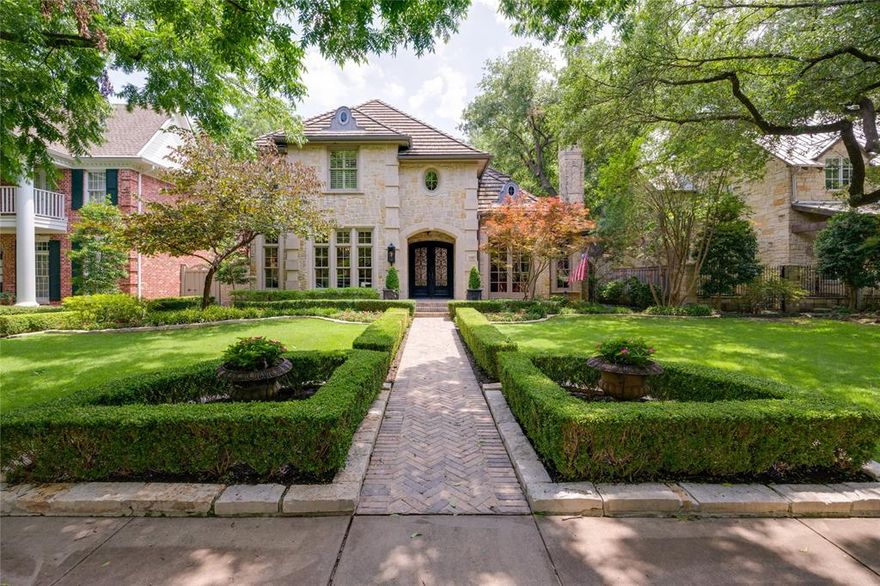 Welcome to luxury living in Highland Park. This expansive 5,830-square-foot home, with a rare downstairs master bedroom, is situated on a beautifully landscaped 65 x 150 lot. It features five bedrooms, elegant formals, and an updated kitchen from 2018. The second floor includes a spacious open living area with built-ins, four additional bedrooms, a gym, and a game room. A large covered patio with a fireplace overlooks a stunning pool, providing the ultimate in comfort and entertainment. Located within walking distance to Armstrong Elementary, don’t miss this home on a highly coveted street in the Highland Park School district!